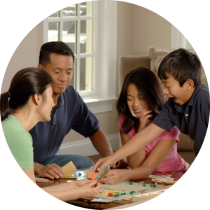 Parents and children playing games and connecting.